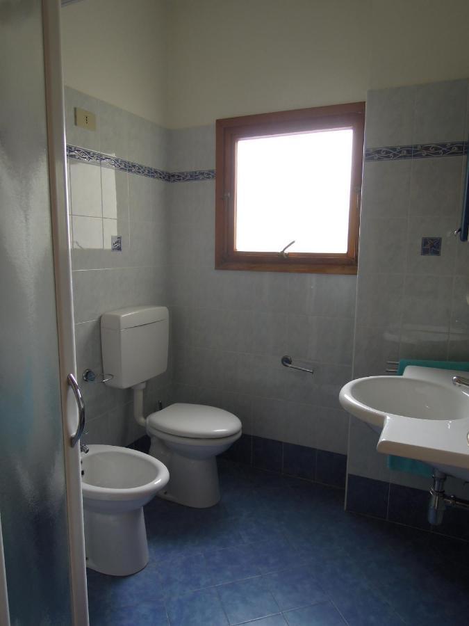 Condominio Laguna Grande Бибионе Экстерьер фото